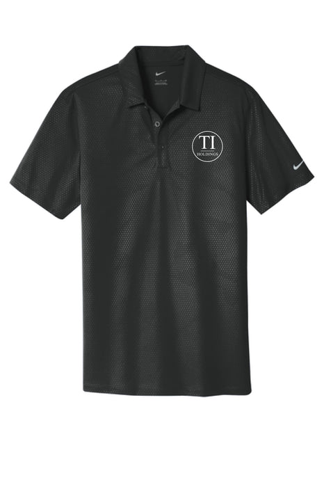 Black Nike polo shirt with a TI holdings logo on a white background