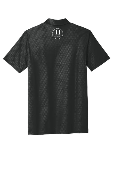 Black Nike polo shirt with a TI holdings logo on a white background