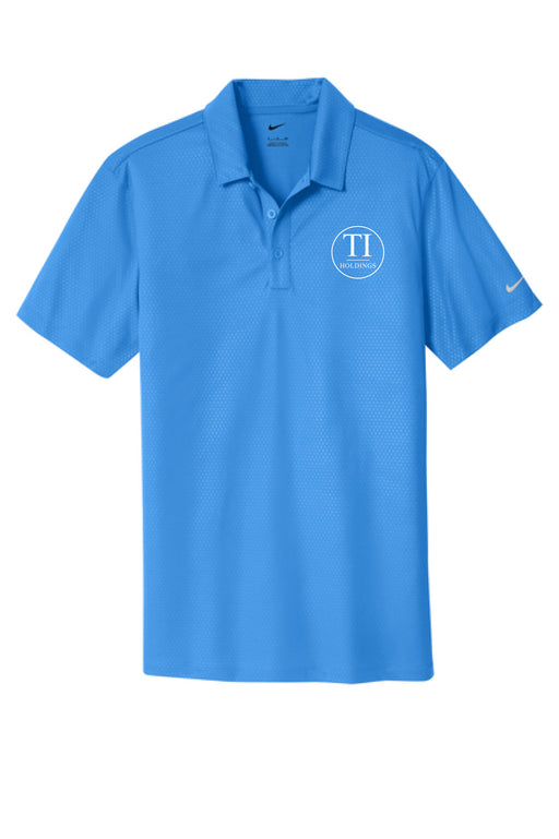 Blue polo shirt with a TI Holdings logo on a white background