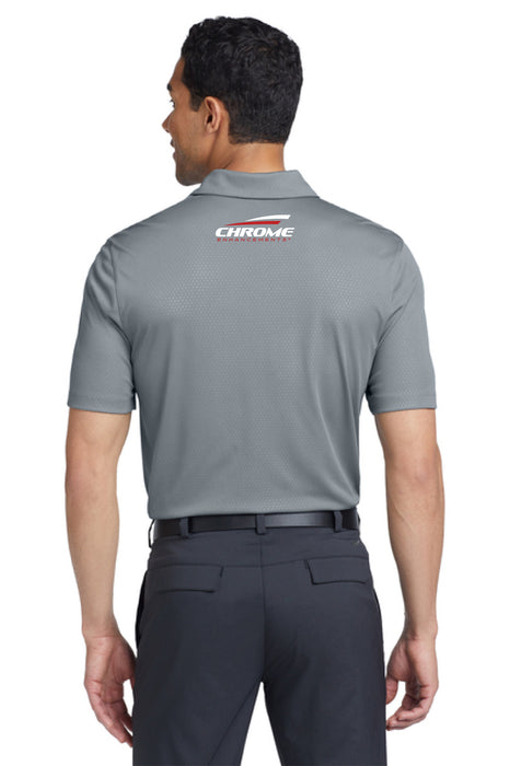 Man wearing a gray Chrome Enhancements polo shirt and pants on a white background