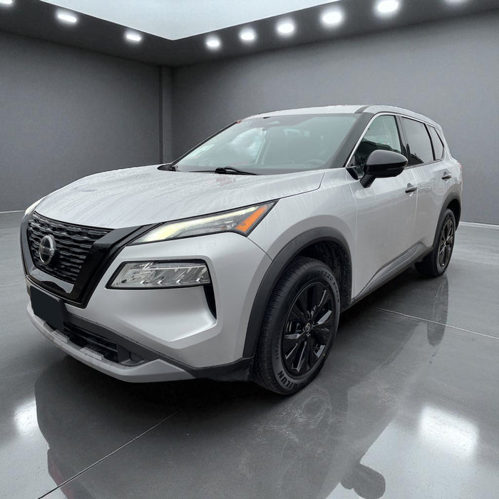 Silver Nissan with chrome delete trim accessories