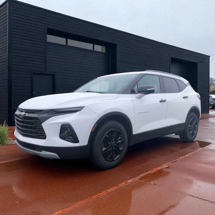 White Chevy Blazer with chrome delete trim accessories installed