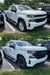 White Chevrolet silverado before and after chrome delete wheel skins installed