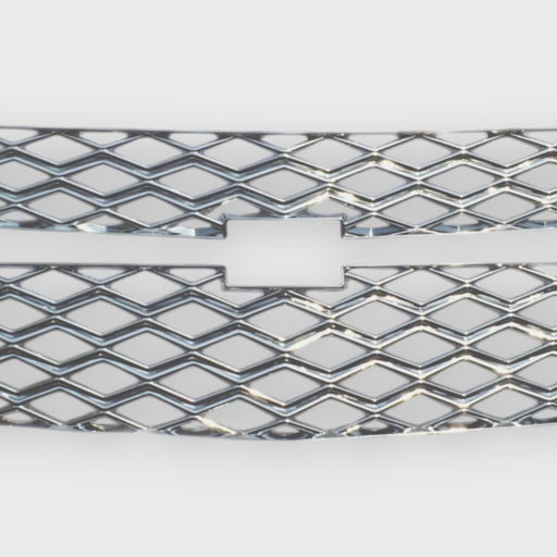 Close-up of a Chevrolet grille with diamond pattern on a white background