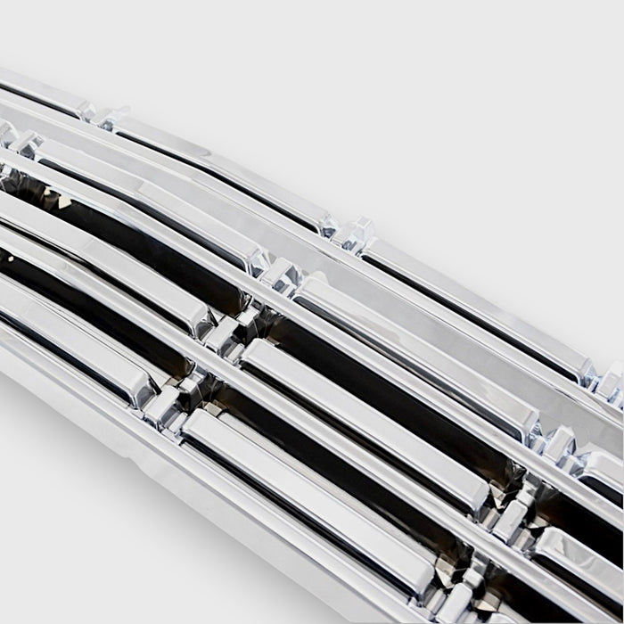 abs523 Close-up of a chrome chevy grille on a white background