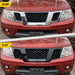 Before and after ABS6580BLK gloss black grille overlay on 2011 Nissan Frontier