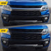 Before and after ABS6597BLK gloss black grille overlay on 2021 Chevrolet Colorado