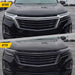Before and after ABS6801BLK gloss black grille overlay on 2023 Chevrolet Equinox