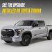 ABS6848BLK gloss black grille overlay installed on a Toyota Tundra