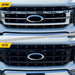 Before and after ABS6852BLK gloss black grille overlay on 2022 Ford F-150 Lariat