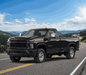 MC364 chrome mirror covers fitted on a Chevrolet Silverado 2500HD, lifestyle photo