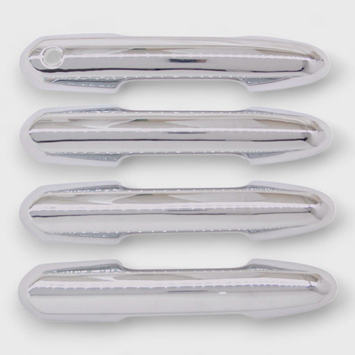 Set of 4 chrome snap-on door handle covers for 2026 Toyota Highlander, front view - DH299