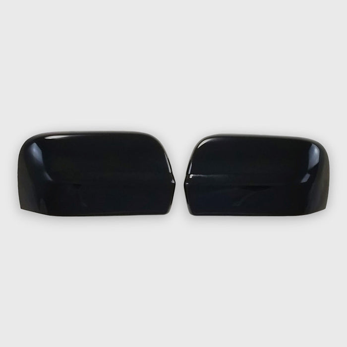 Gloss black chrome delete mirror covers for 2024 Nissan Titan, front view - MC6297BLK