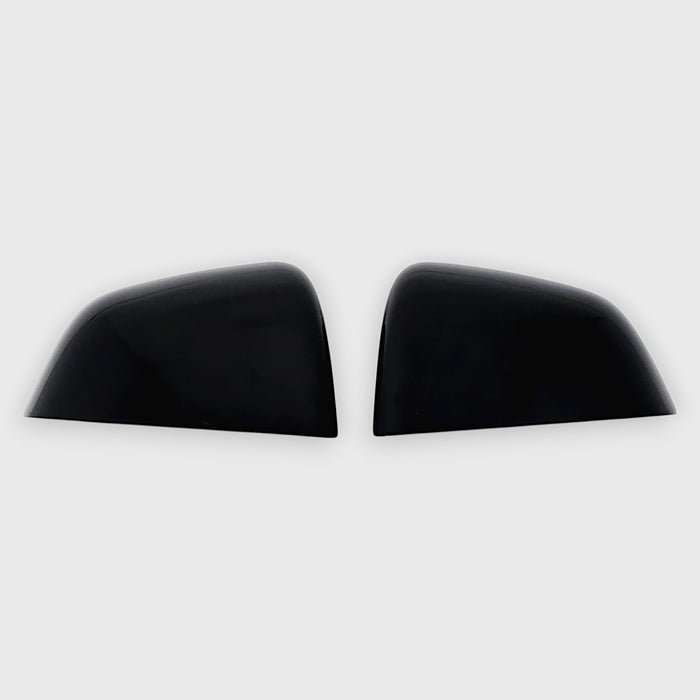 Two black chrome delete car side mirrors with red accents on a white background