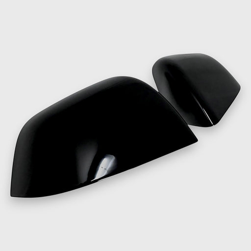 Two black chrome delete car side mirrors with red accents on a white background