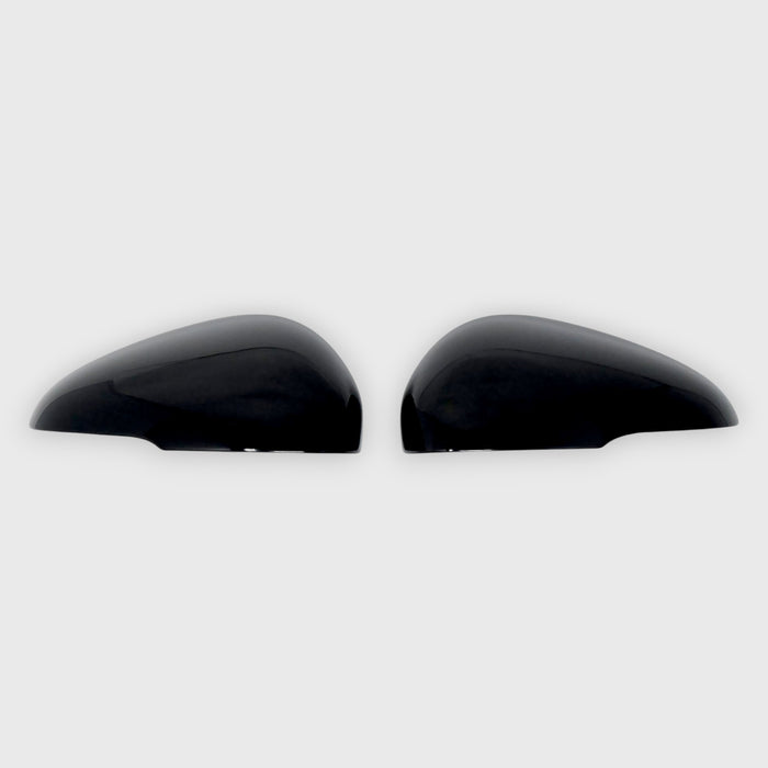 Two black car mirrors on a white background