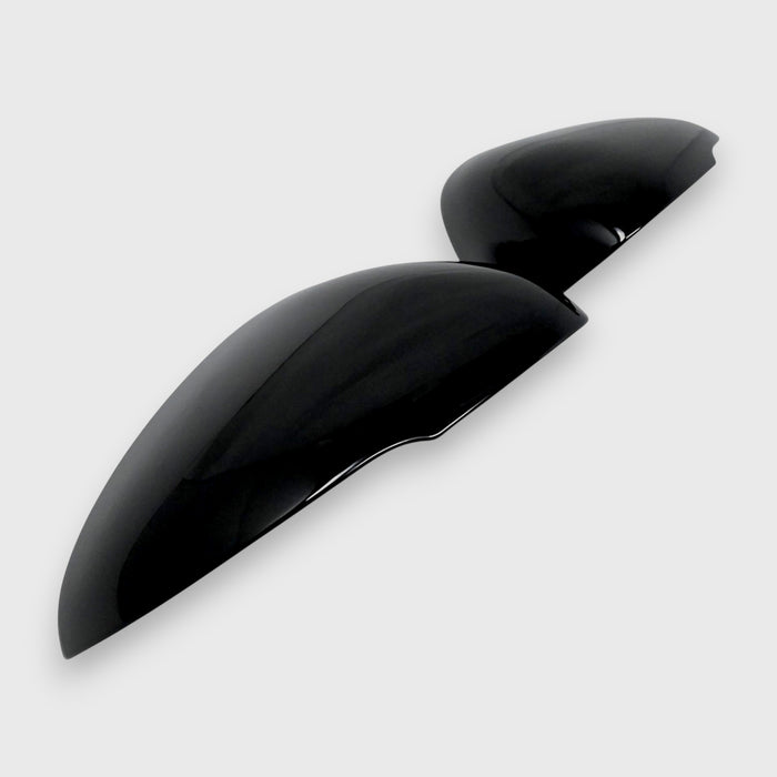 Two black car mirrors on a white background