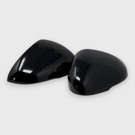 Two black car mirrors on a white background