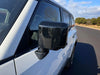 Close-up of MC6393BLK gloss black mirror covers for 2024 Toyota Land Cruiser