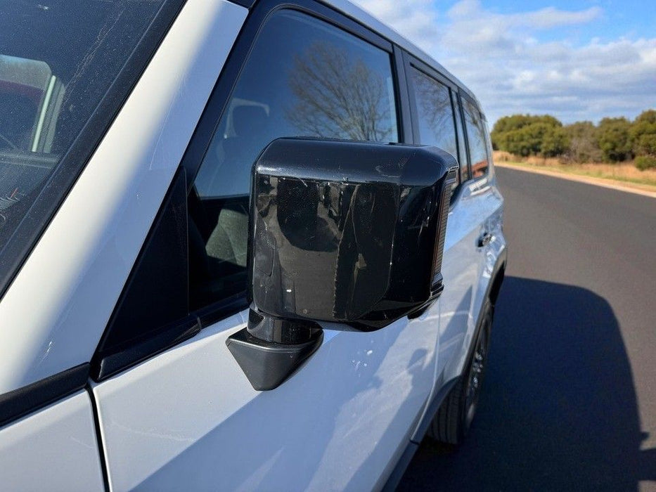 Close-up of MC6393BLK gloss black mirror covers for 2024 Lexus GX550