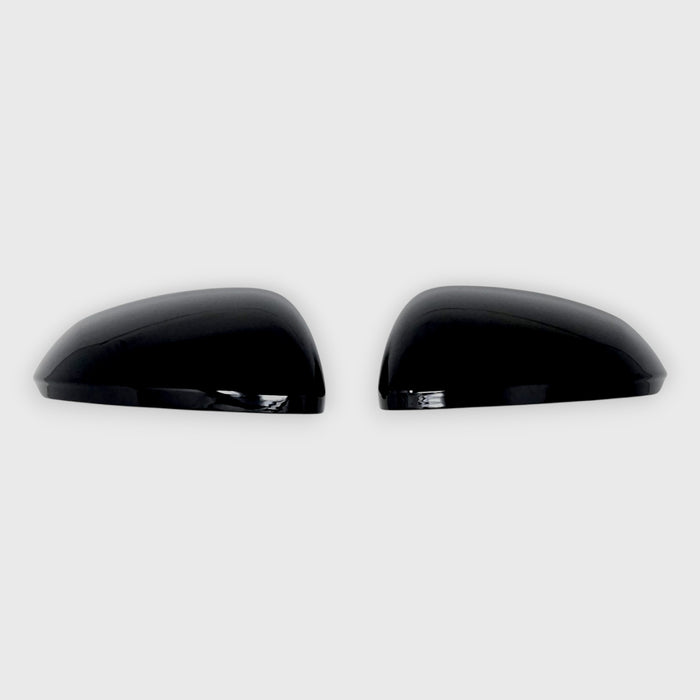 Two black car mirrors on a white background