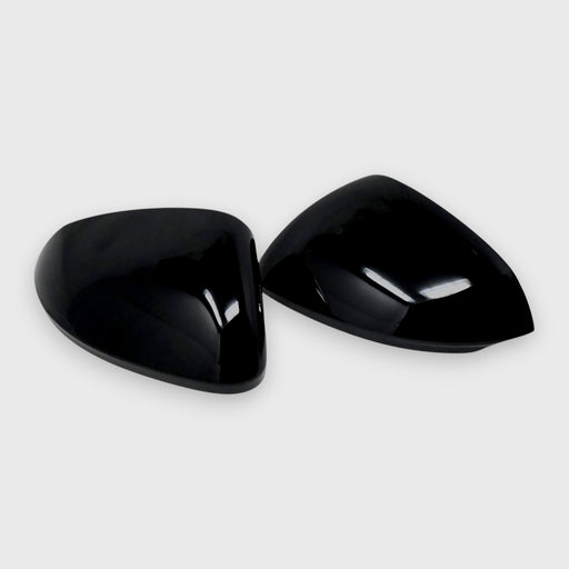 Two black car mirrors on a white background