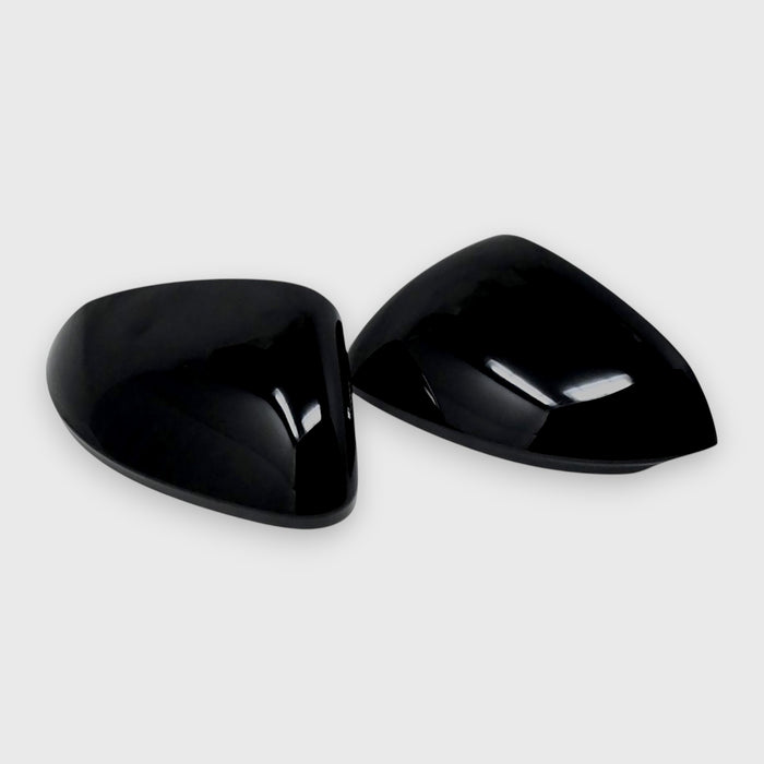 Two black car mirrors on a white background