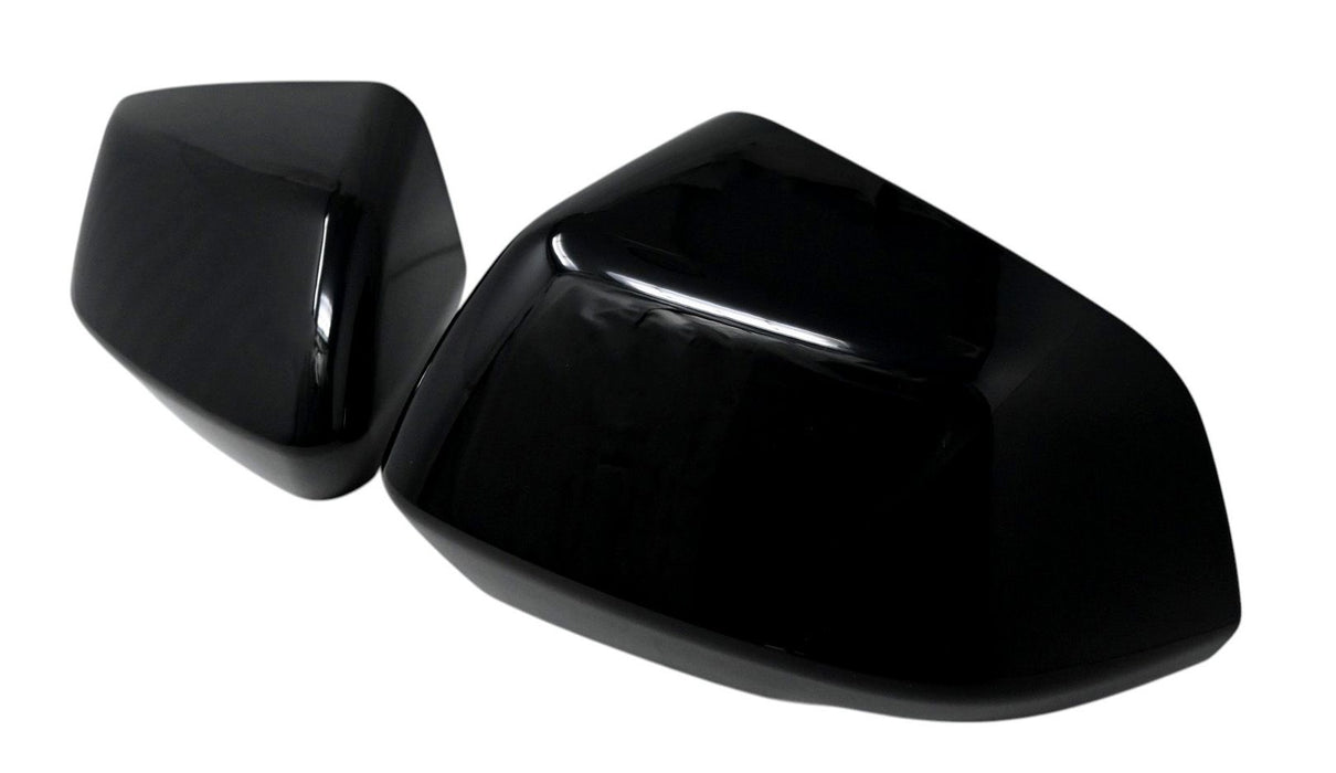 MC6406BLK gloss black mirror covers for 2024 Cadillac XT4, angled view of the 2-piece set