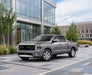2017 Nissan Titan before: factory chrome mirror trim