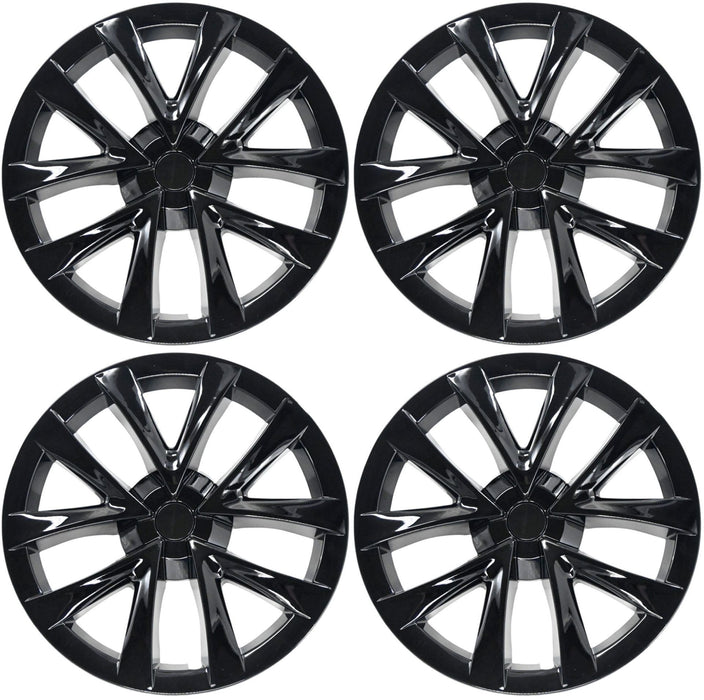 Four WC124-18BLK gloss black wheel covers from the set for 2021 Tesla Model 3