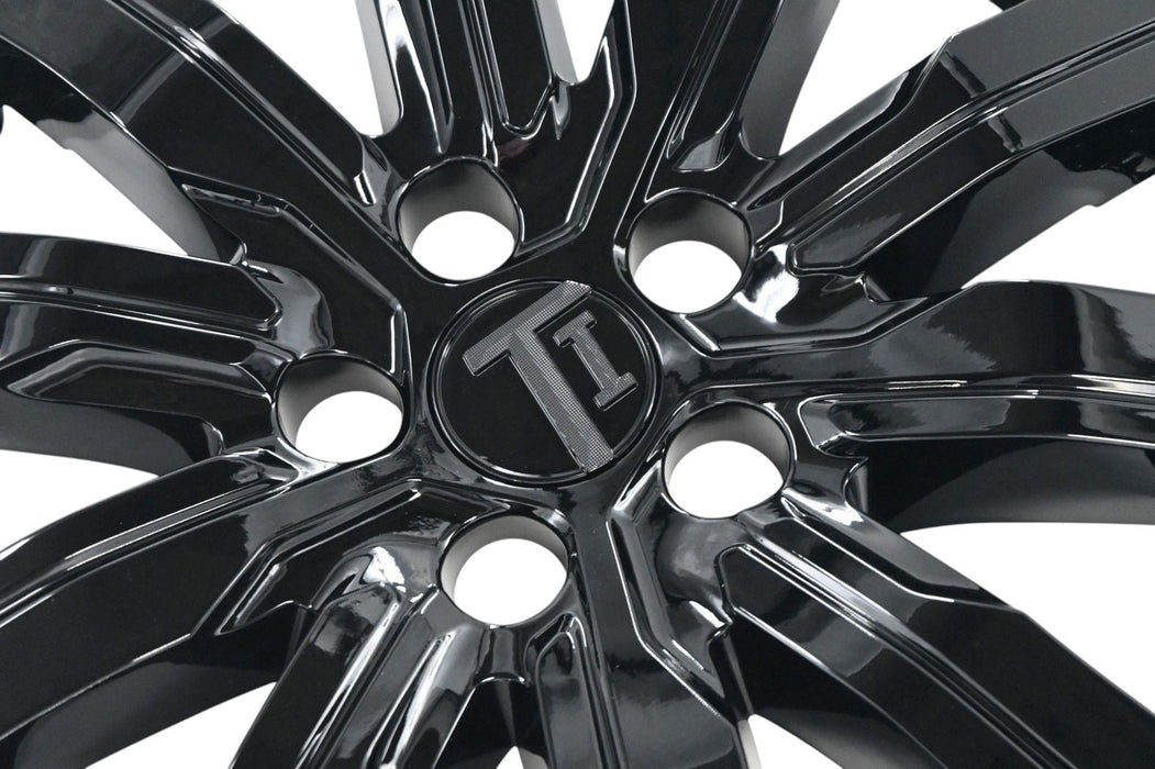 Close-up of WSK712-18BLK gloss black wheel skins for 2023 Cadillac XT4