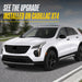 WSK712-18BLK gloss black wheel skins installed on a Cadillac XT4