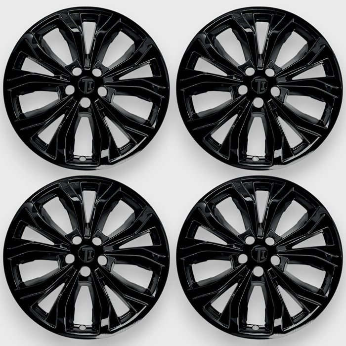 Four WSK715-20BLK gloss black wheel skins from the set for 2021 Ford Explorer