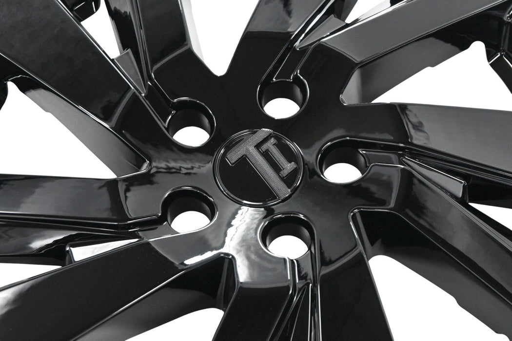 Close-up of WSK742-18BLK gloss black wheel skins for 2023 Chevrolet Equinox