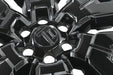 Close-up of WSK750-17BLK gloss black wheel skins for 2023 Nissan Frontier