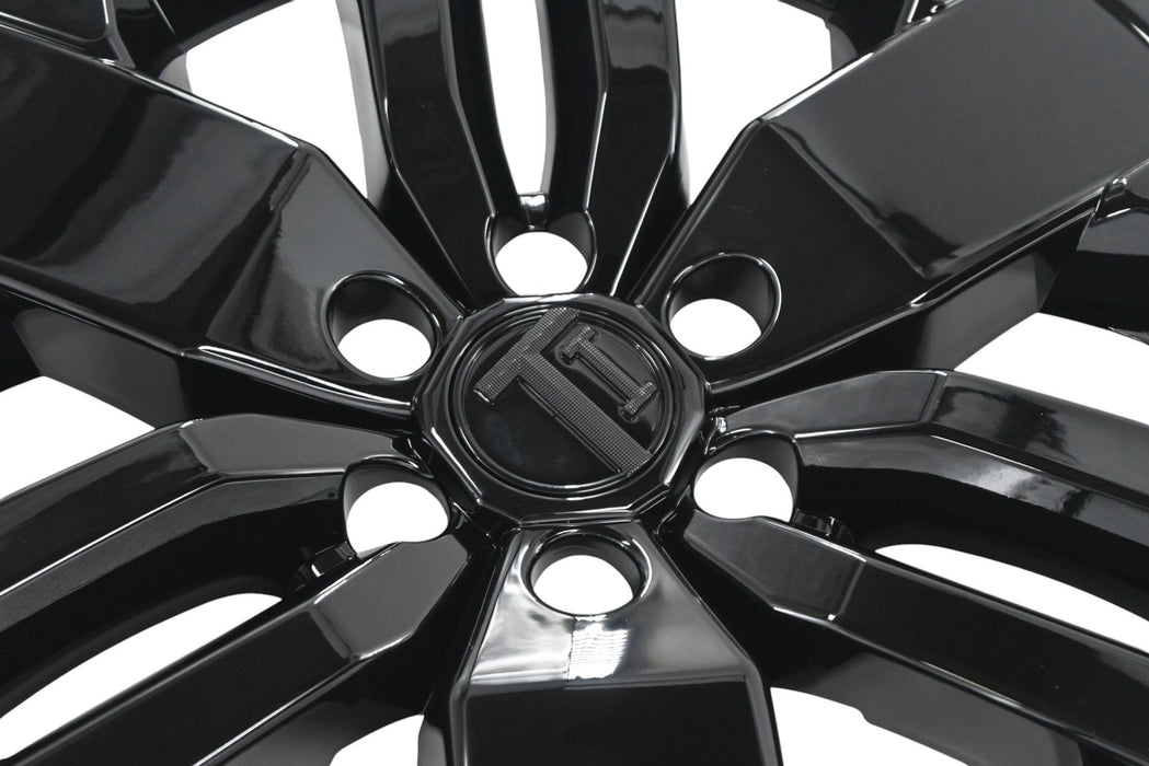 Close-up of WSK816-17BLK gloss black wheel skins for 2025 Nissan Frontier