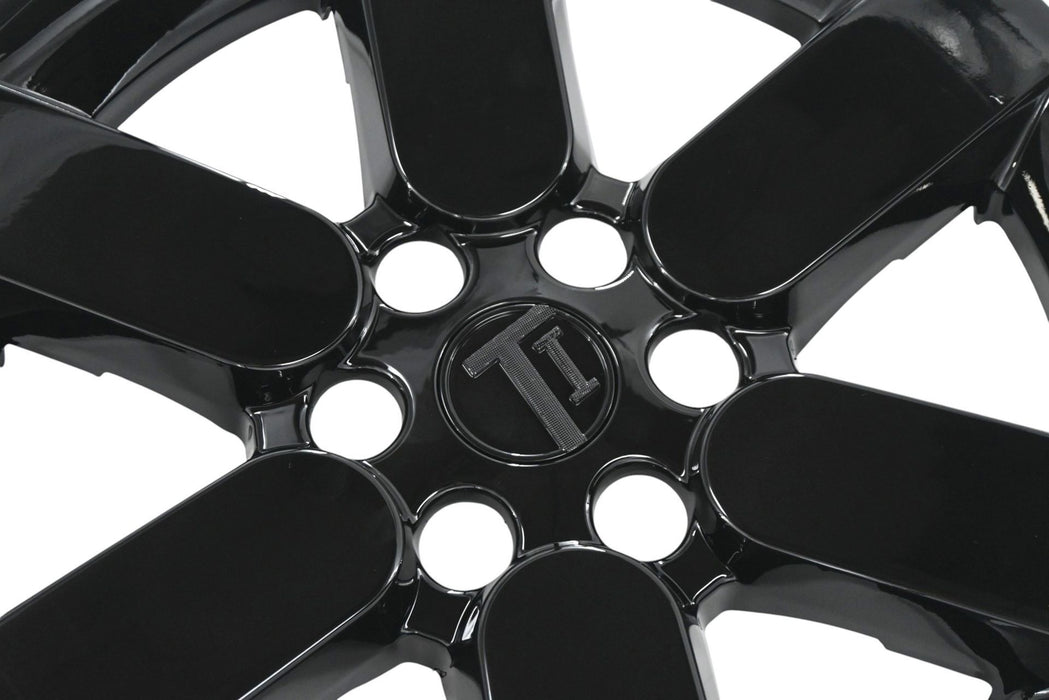 Close-up of WSK831-19BLK gloss black wheel skins for 2026 Honda Prologue